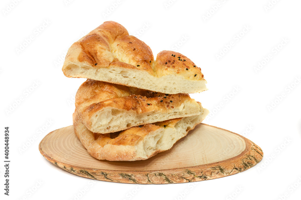 Turkish Ramadan Bread - ramazan pidesi (Pita) isolated on white. Traditional popular food for fasting in holy Ramadan month in Turkey
