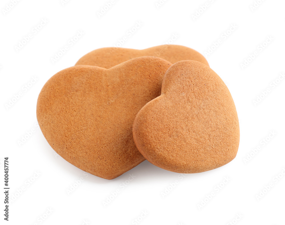 Tasty heart shaped gingerbread cookies isolated on white Tasty heart shaped gingerbread cookies isolated on white
