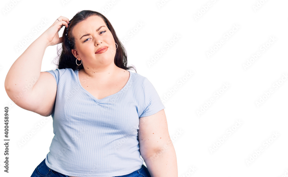 Young plus size woman wearing casual clothes confuse and wonder about question. uncertain with doubt, thinking with hand on head. pensive concept. Young plus size woman wearing casual clothes confuse and wonder about question. uncertain with doubt, thinking with hand on head. pensive concept.