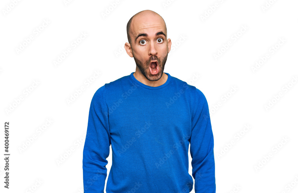 Young hispanic man wearing casual clothes afraid and shocked with surprise expression, fear and excited face. Young hispanic man wearing casual clothes afraid and shocked with surprise expression, fear and excited face.