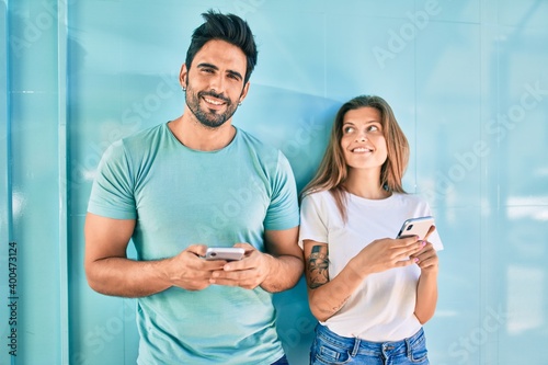 Young couple of boyfriend and girlfriend together using smartphone
