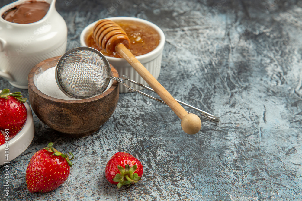front view sweet honey with strawberries on dark background sweet honey sugar bee