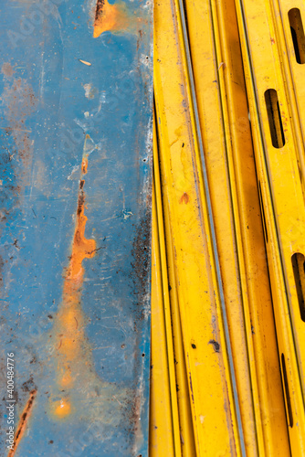 Yellow and blue zinc sheets overlaid.