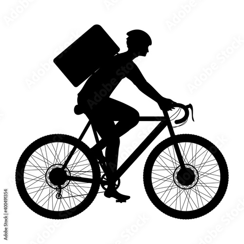 Silhouette of man riding bicycle