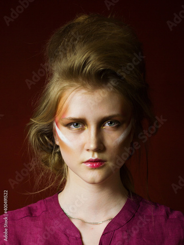 portrait of a young blonde woman with fashion make up