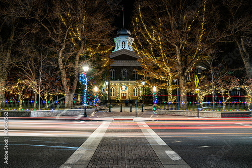 Image of the capitol building in Carson City Nevada. Christmas time with christmas lights and car lights streaking by.