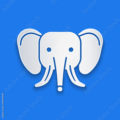 Paper cut Elephant icon isolated on blue background. Paper art style. Vector.