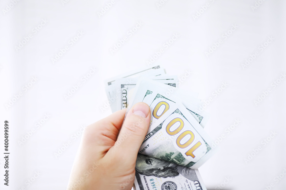 Group of money stack of 100 US dollars banknotes a lot of the background texture. Cash money in a large pile as a finance background. Group of money stack of 100 US dollars banknotes a lot of the background texture. Cash money in a large pile as a finance background.