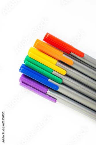 Rainbow pens put together. Represents a symbol of queer sex