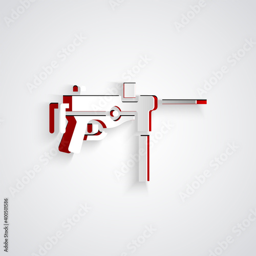 Paper cut Submachine gun M3, Grease gun icon isolated on grey background. Paper art style. Vector.