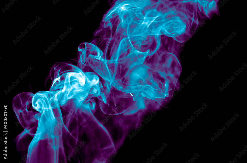 Purple and blue smoke isolated on black background. Abstraction Purple and blue smoke isolated on black background. Abstraction