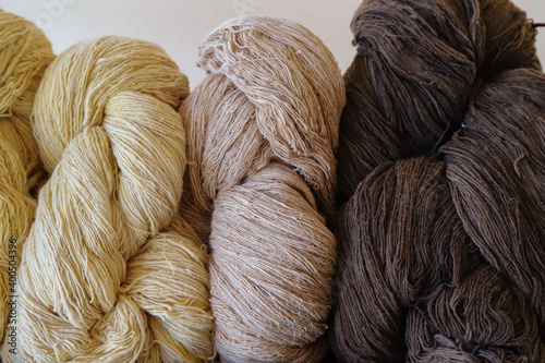 Closeup of colorful cotton thread rolls.