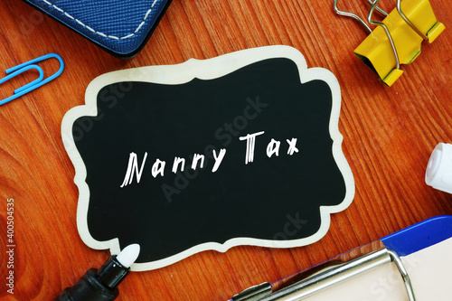 Fotografía Financial concept about Nanny Tax with sign on the page.