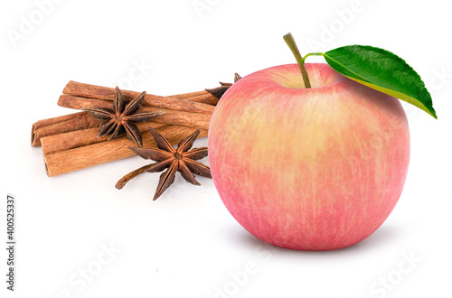 Fresh ripe pink fuji apple fruit with half slice and cinnamon with  green leaf isolated on white background.
