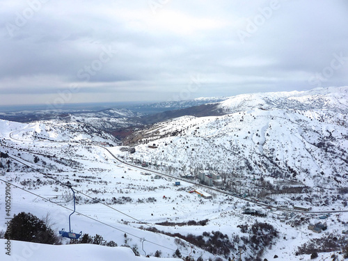 Beautiful panorama of Chimgan, mountains covered with snow in winter, landscape