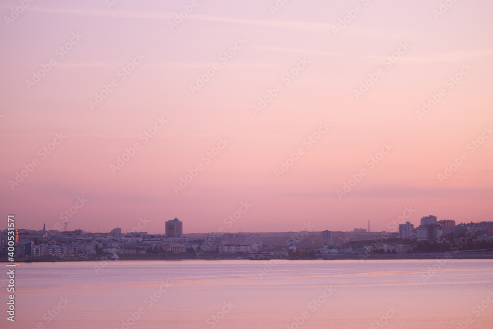 Sunset over a distant city