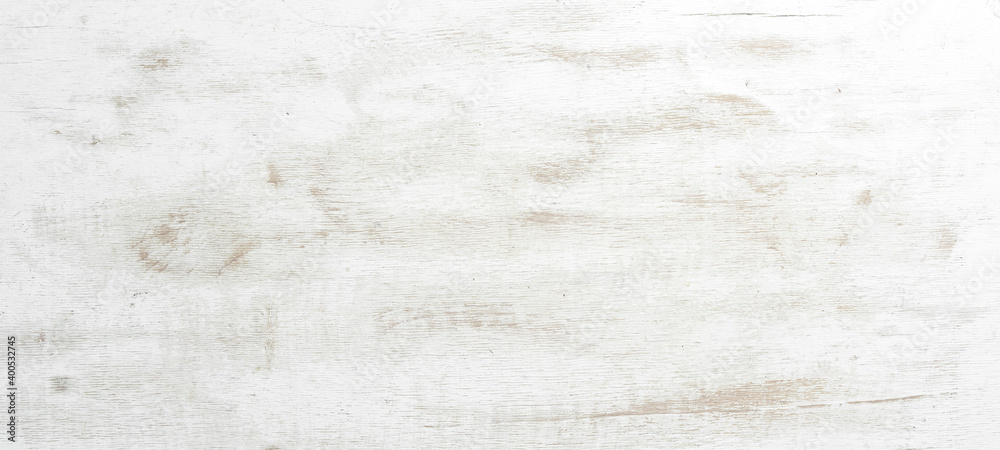 Textured white wooden background. Top view. Free copy space.