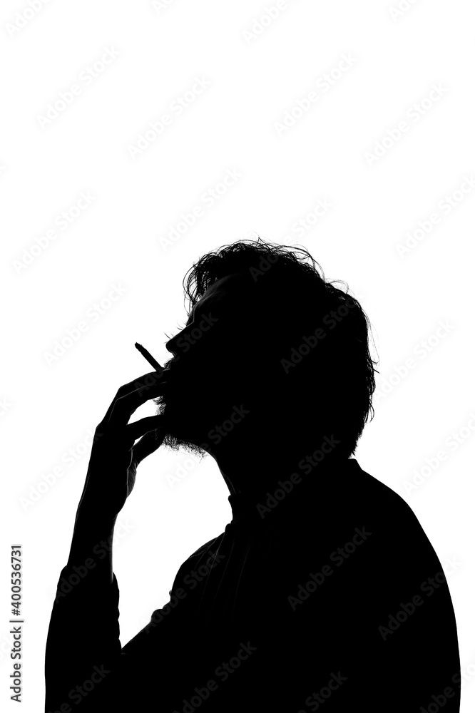 Monochrome silhouette of a smoking man isolated on white background.