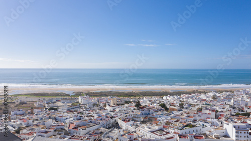 Aerial views of white town in the province of Cadiz, Andalusia. Conil de la frontera seen from above, in south Spain
