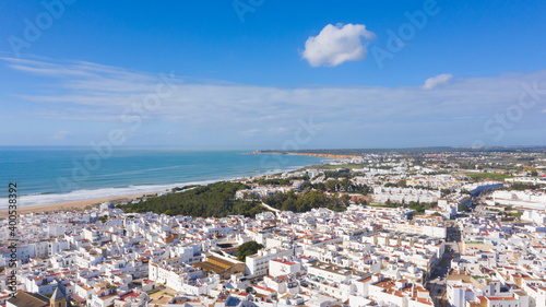 Aerial views of white town in the province of Cadiz, Andalusia. Conil de la frontera seen from above, in south Spain © Avril