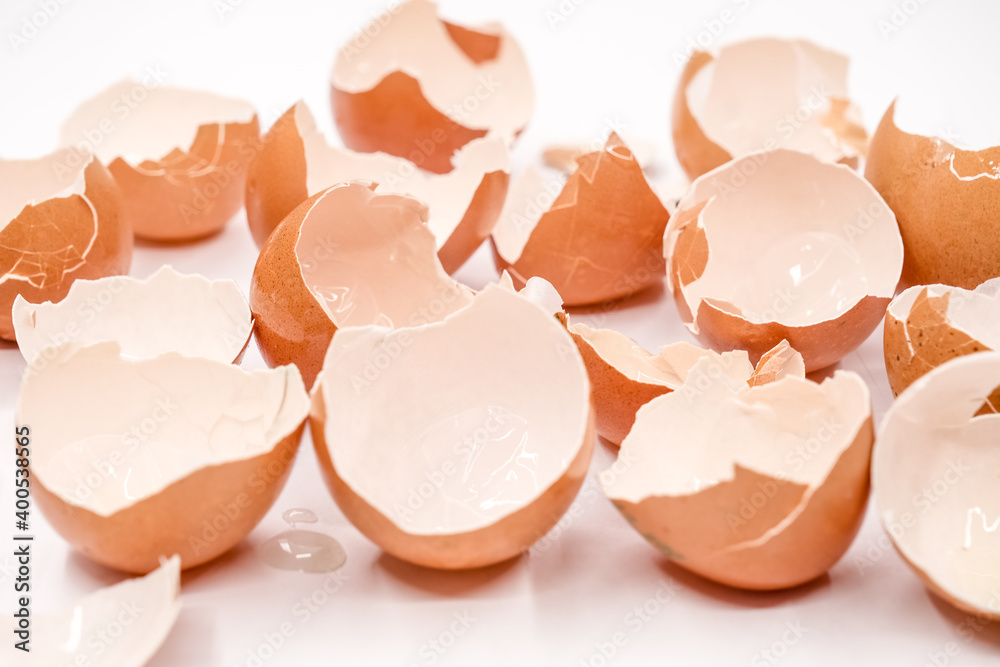 broken empty eggshells on white background broken empty eggshells on white background