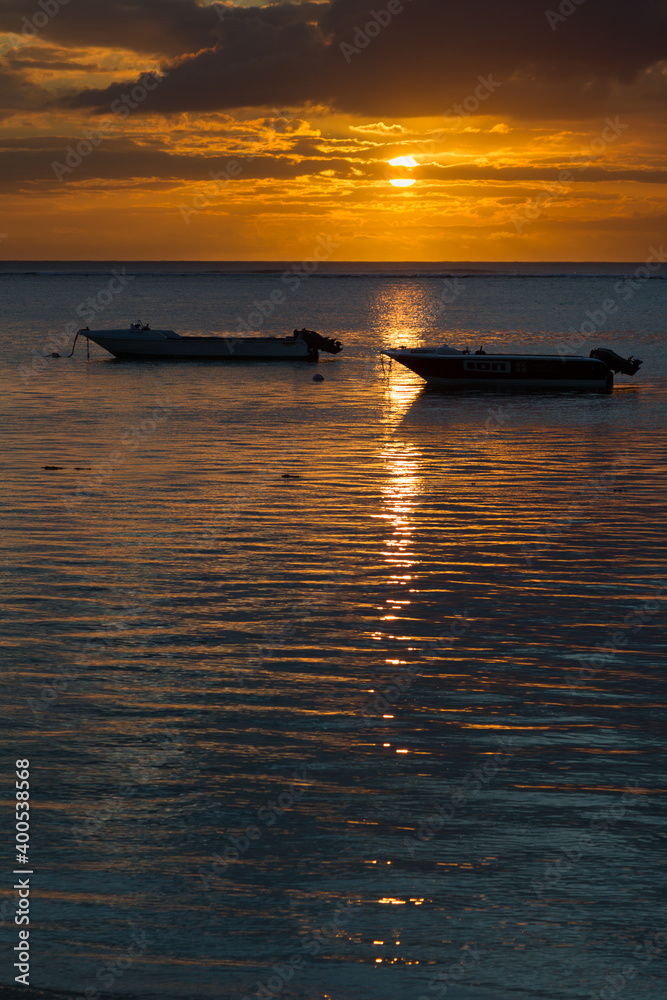 Sunset over the Indian Ocean near Le Morne on the west coast of Mauritius, Africa.