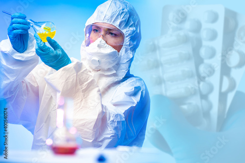 A girl in a protective suit is developing new vaccines. Scientific research in the field of medicine. Microbiology. The establishment of effective antibiotics. Medical treatment of diseases.