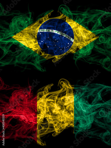 Brazil, Brazilian vs Guinea smoky mystic flags placed side by side. Thick colored silky abstract smoke flags.