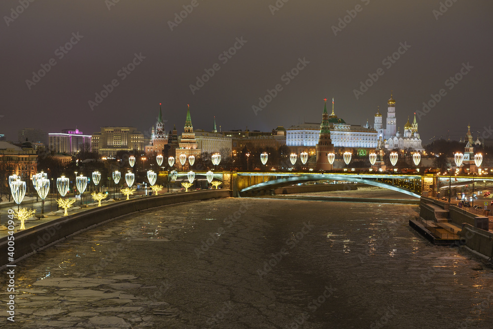 Fototapeta premium Photography of Moscow cityscape in night. View from above. Kremlin wall, Towers, Residence of President of the Russian Federation, Ivan the Great Bell Tower, Dormition Cathedral