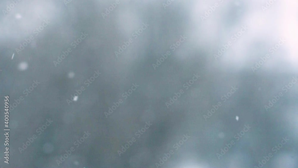 Winding snowflakes on a blurred background. Winter. Nightfall. Winding snowflakes on a blurred background. Winter. Nightfall.
