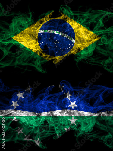 Brazil, Brazilian vs United States of America, America, US, USA, American, Hampton Roads, Virginia smoky mystic flags placed side by side. Thick colored silky abstract smoke flags.