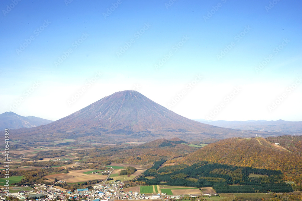 Mount Yotei with city landscape of Rusutsu in Hokkaido, Japan. aerial view - 紅葉した景色 羊蹄山 ルスツ 北海道虻田郡留寿都村	