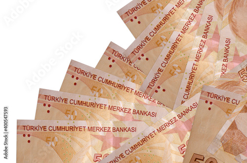 50 Turkish liras bills lies in different order isolated on white. Local banking or money making concept photo