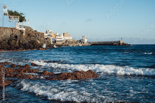 Volcanic seashore of Tenerife Island with a view on the Atlantic Ocean