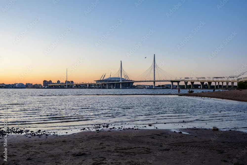 Beautiful sunset in the Gulf of Finland. Zenith Arena and Cable-stayed Bridge.