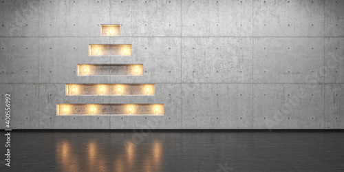 Weihnachtsbaum in Beton mit Glühbirnen