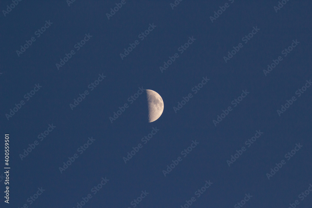 First quarter moon on a clear night sky First quarter moon on a clear night sky