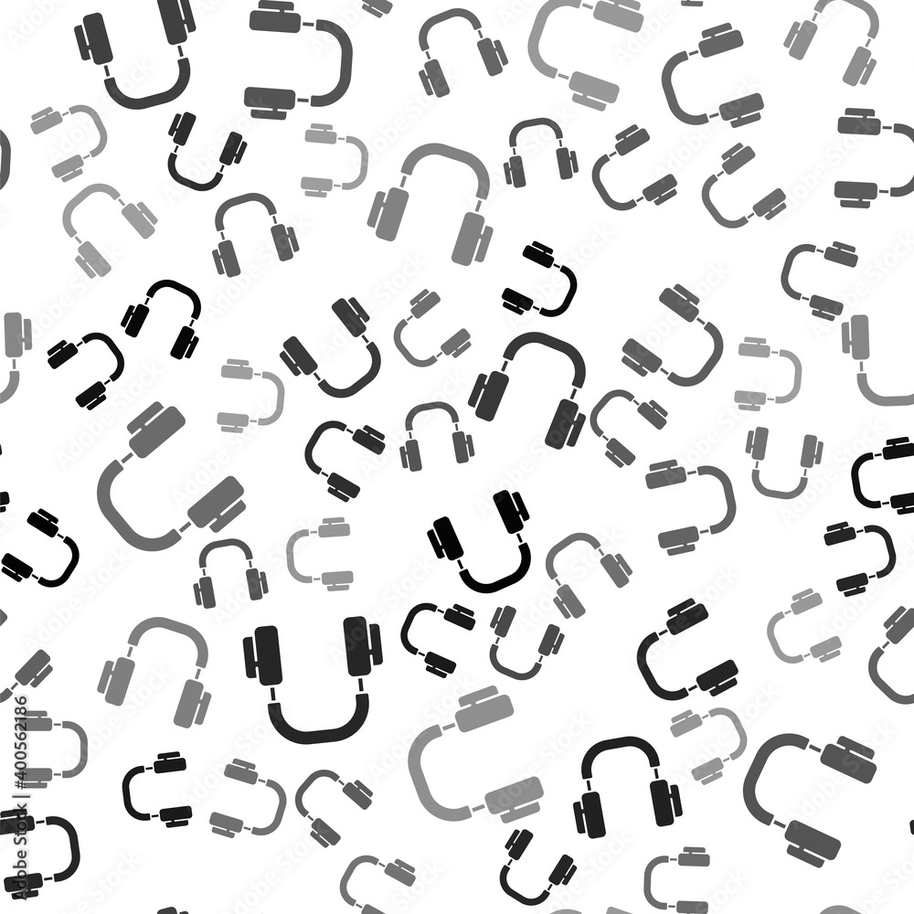 Black Headphones icon isolated seamless pattern on white background. Earphones. Concept for listening to music, service, communication and operator. Vector. Black Headphones icon isolated seamless pattern on white background. Earphones. Concept for listening to music, service, communication and operator. Vector.
