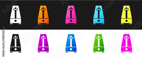 Set Classic Metronome with pendulum in motion icon isolated on black and white background. Equipment of music and beat mechanism. Vector.