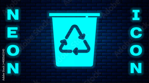 Glowing neon Recycle bin with recycle symbol icon isolated on brick wall background. Trash can icon. Garbage bin sign. Recycle basket sign. Vector.