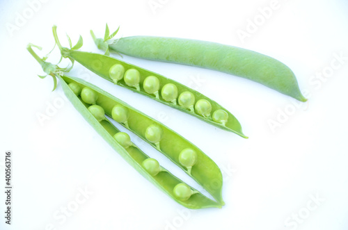 the ripe green peas isolated on white background.
