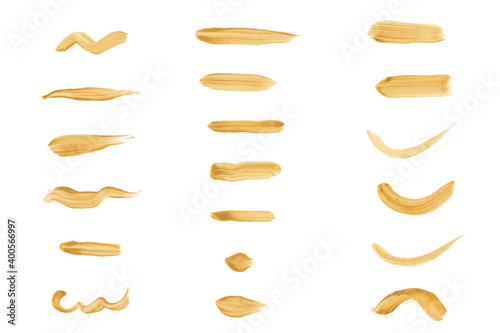 Set of gold brush paint stroke. Acrylic paint. Vector golden paint strokes, stain set. Abstract golden sparkling textured art illustration. Stock vector illustration.