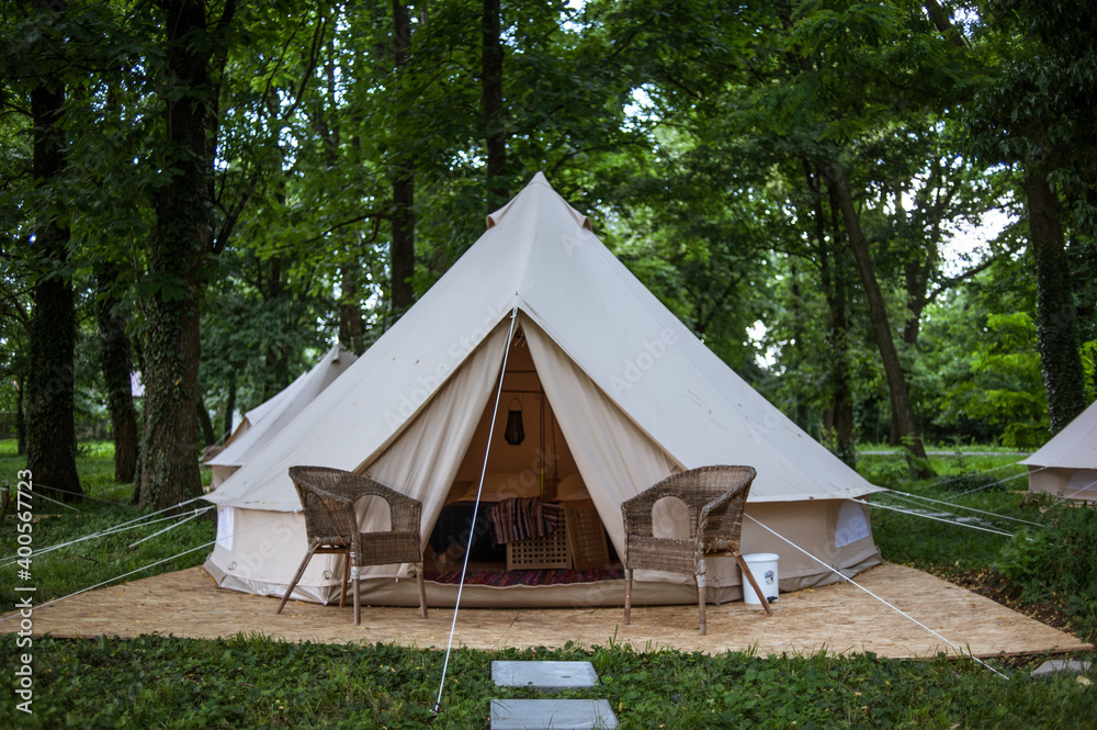 Glamping site in the woods on a calm afternoon.