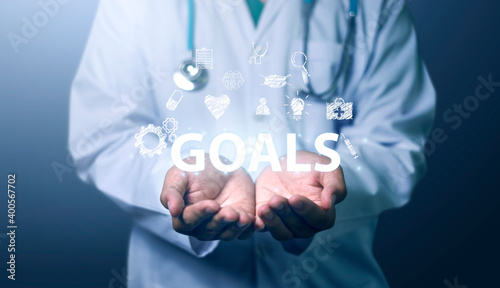 Medical Technology on 2021 target set goals achievement new year resolution, doctor health care worker planning saving world pandemic COVID-19 strategy ideas, graphic icon copy space blue background