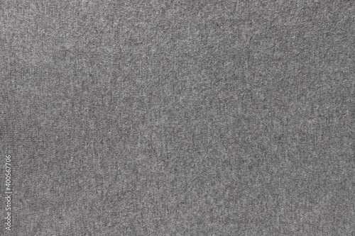 Ultimate Gray knitted clothes. Concept of color of year 2021. knitted texture background.