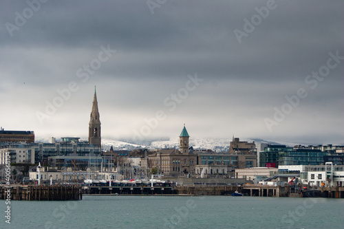 Dun Laoghaire town, bay, with snowed hills in background Ireland, Europe