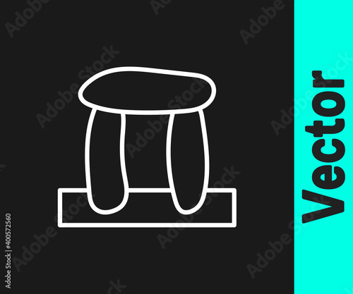 White line Stonehenge icon isolated on black background. Vector.