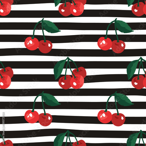 Vector seamless summer pattern with cherries on black and white striped background.