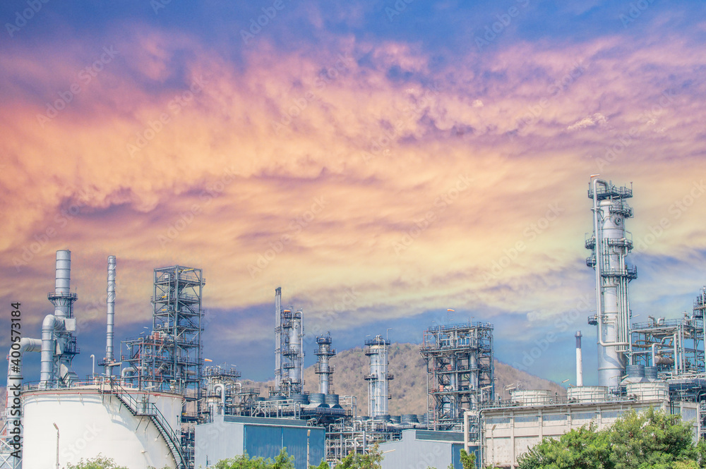 Fototapeta premium Industrial zone,The equipment of oil refining,Close-up of industrial pipelines of an oil-refinery plant,Detail of oil pipeline with valves in large oil refinery.