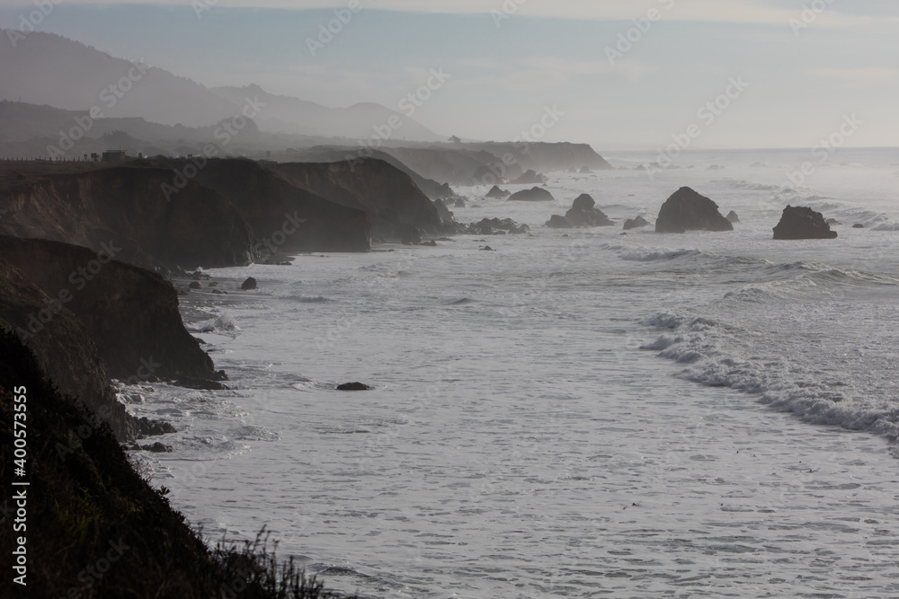 The cold waters of the Pacific Ocean beat against the rocky coastline of Northern California in Mendocino. The scenic Pacific Coast Highway runs along this amazing part of the west coast.